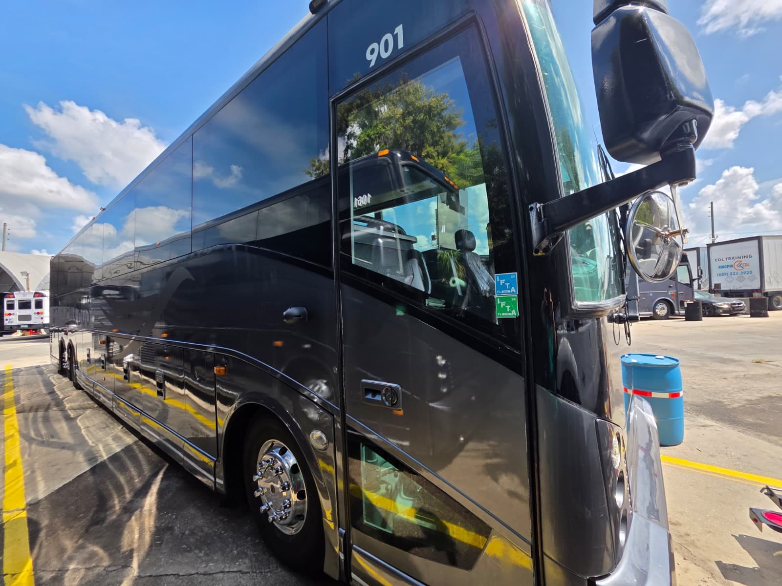 2014 Van Hool CX45 motorcoach, front three-quarter exterior view