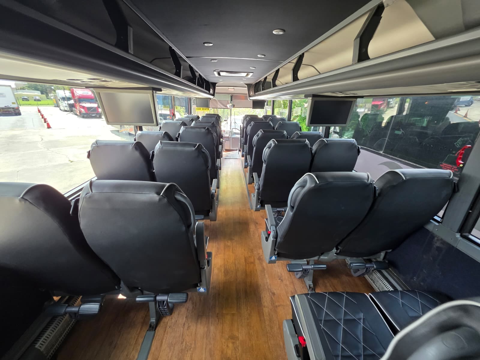 Cabin view with flip-down video monitors