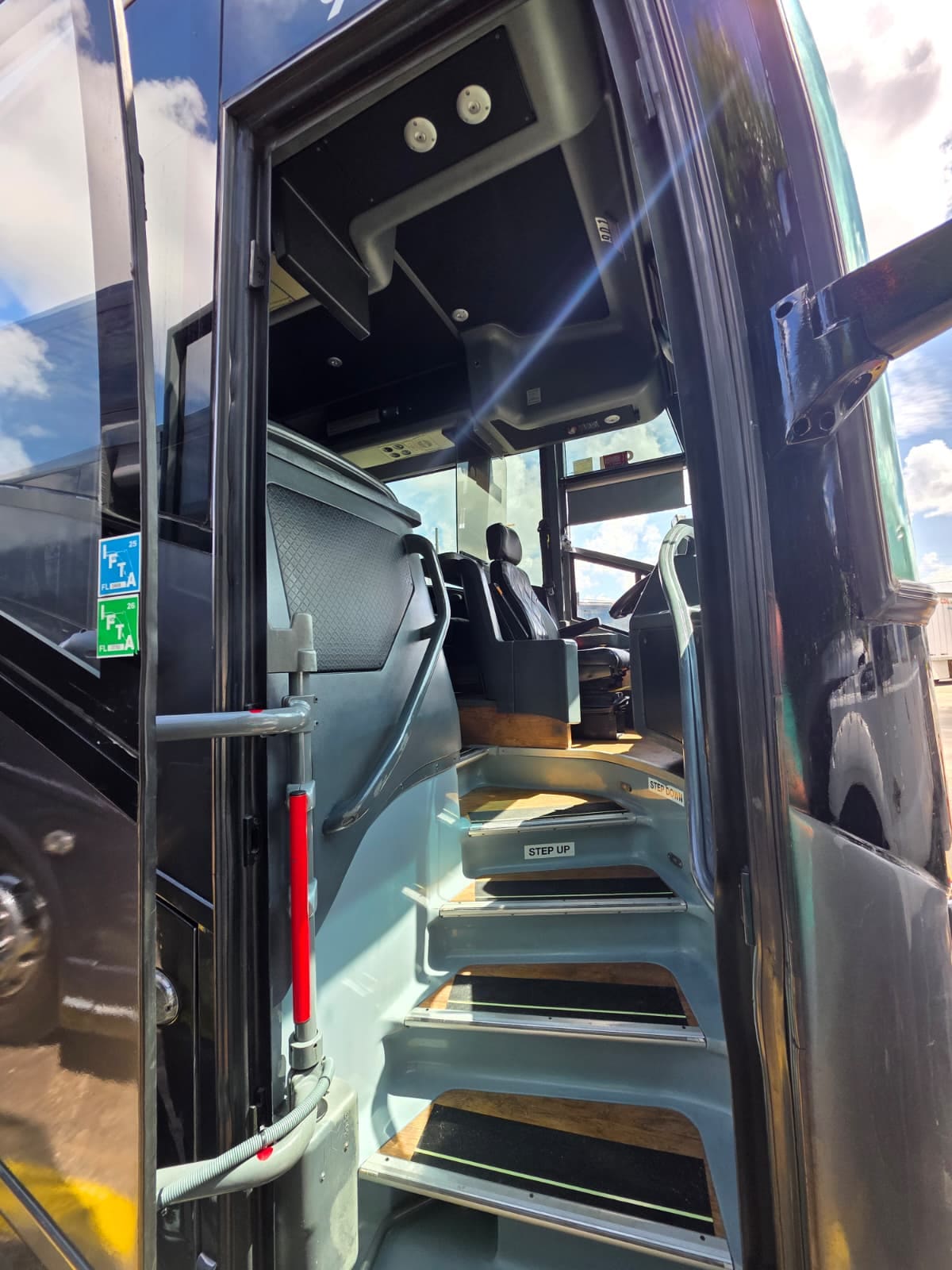 Entry stairwell and door with handrails